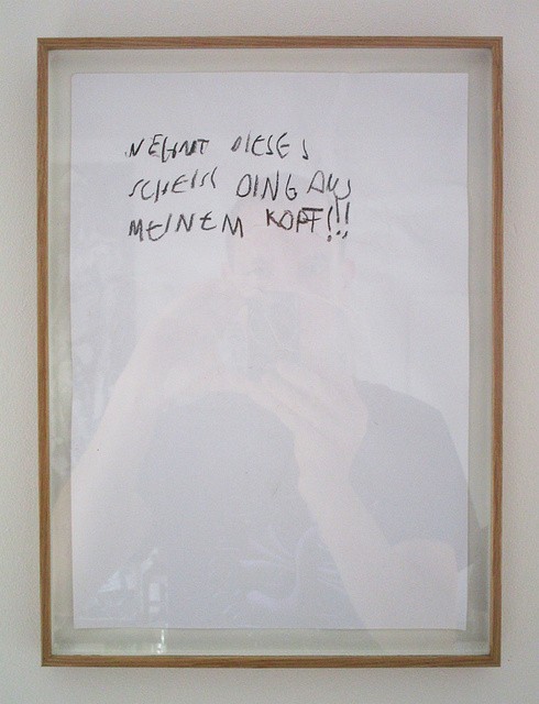 NEHMT DIESES SCHEISS DING AUS MEINEM KOPF!!!, Text, Tränenflüssigkeit, Nasensekret, Speichel auf zerknittertem Papier, 21 x 29,7 cm, 31 